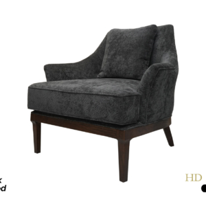 The Livia Armchair featuring a sleek, contemporary design with plush upholstery and elegant curves, supported by a sturdy yet minimalist frame, perfect as a stylish accent chair for a modern living room or bedroom.