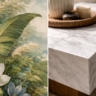 A close-up shot showing the curve of a botanical leaf pattern next to the sharp edge of a modern marble coffee table